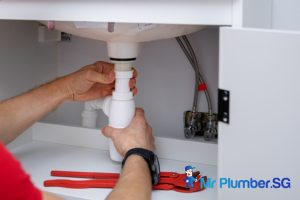 kitchen-sink-bottle-trap-installation-different-types-of-plumbing-installation-services-in-singapore-plumbing-installation-mr-plumber-singapore